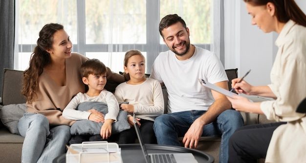 close-up-smiley-family-therapist_23-2149220329